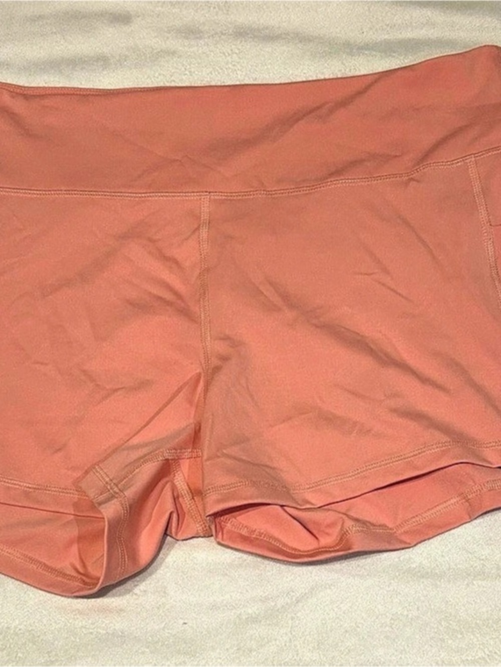 Puma high-waisted athletic shorts in orange size small